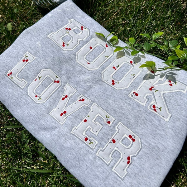 Cherry fabric embroidered book lover sweatshirt