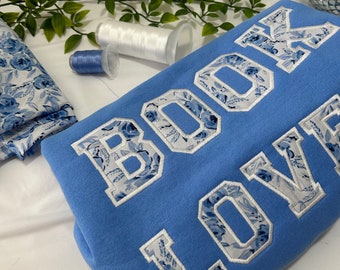 Blue floral fabric embroidered book lover sweatshirt