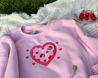 Cherry heart, the way to my heart is through books embroidered sweatshirt
