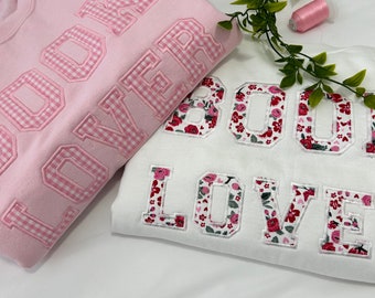 Pink gingham fabric embroidered book lover sweatshirt, valentines day