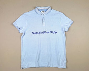 niebieskie polo Nigdy Nie Mów Nigdy Ciemięga vintage klasyczna błękitna bawełniana koszulka Y2K wixapol