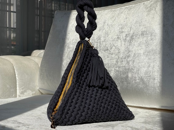 Pyramid store clutch bag