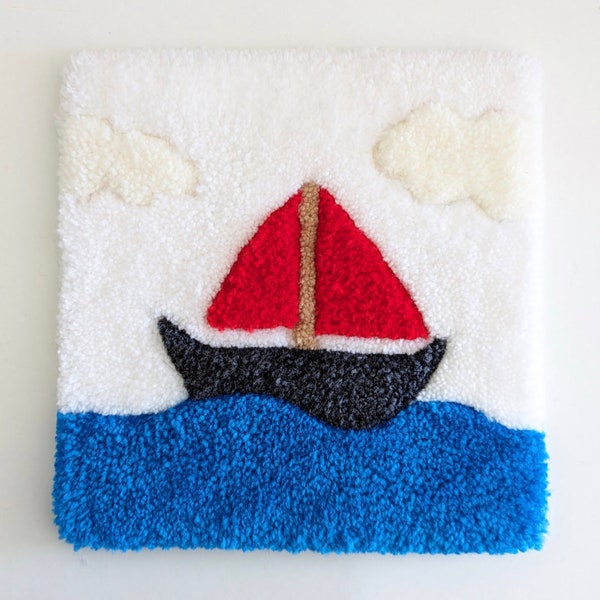 Tapis Tufting Bateau rouge sur l'eau