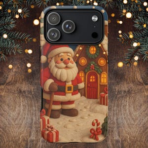 May include: A phone case featuring a festive Christmas design. The case depicts Santa Claus in a red suit, standing in front of a gingerbread house. Presents and candy canes are also visible, creating a holiday theme.