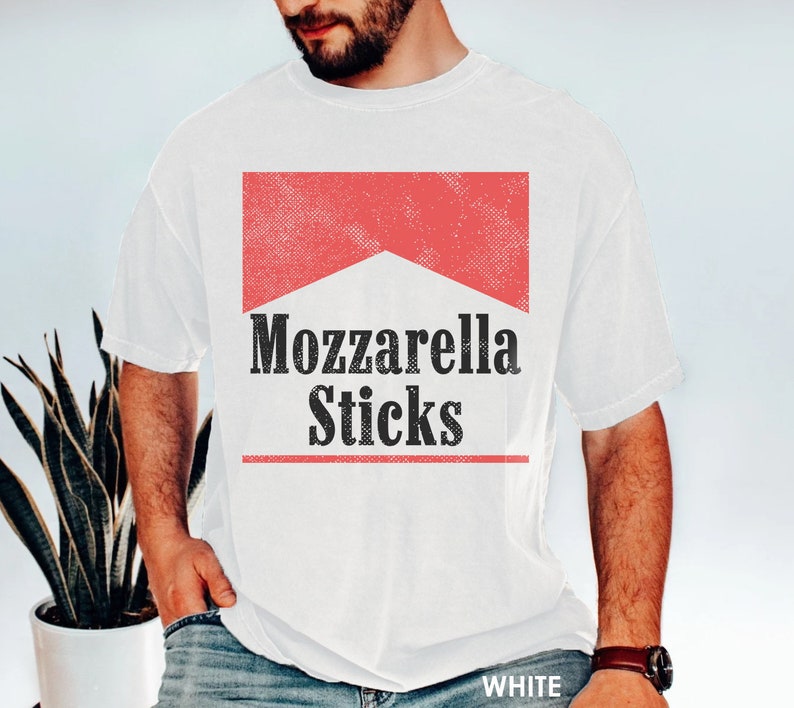 May include: White t-shirt with a red and white graphic that says "Mozzarella Sticks" in black text.