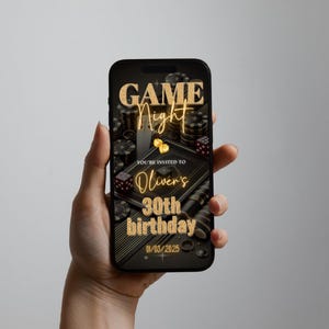 May include: A black smartphone displaying a digital invitation for a game night party. The invitation features a black and gold design with poker chips, dice, and the text "GAME Night Oliver's 30th birthday 01/03/2025".