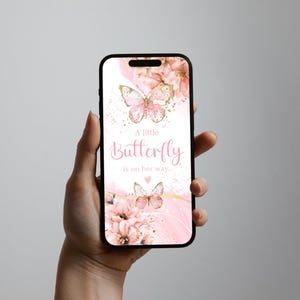 May include: A pink and gold phone case with a butterfly design and the text "A little Butterfly is on her way..."