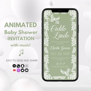 May include: A smartphone displays a baby shower invitation. The invitation features the text "Cielito Lindo" and details for Martin Garcia's baby shower. The phone also shows the words "Animated Baby Shower Invitation with music!" and social media icons.