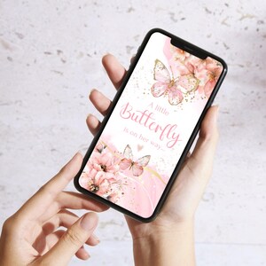 May include: A pink and gold smartphone wallpaper featuring a butterfly and flowers. The text on the wallpaper reads "A little Butterfly is on her way."