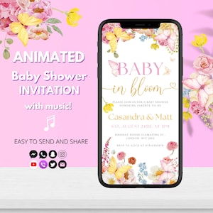 K&ouml;nnte beinhalten: Ein Smartphone zeigt eine Babyparty-Einladung mit Blumen- und Schmetterlingsgrafiken. Die Einladung lautet "Baby in Bloom" und enth&auml;lt Veranstaltungsdetails. Auf dem Bildschirm steht "Animierte Babyparty-Einladung mit Musik!" und "Einfach zu senden und zu teilen."