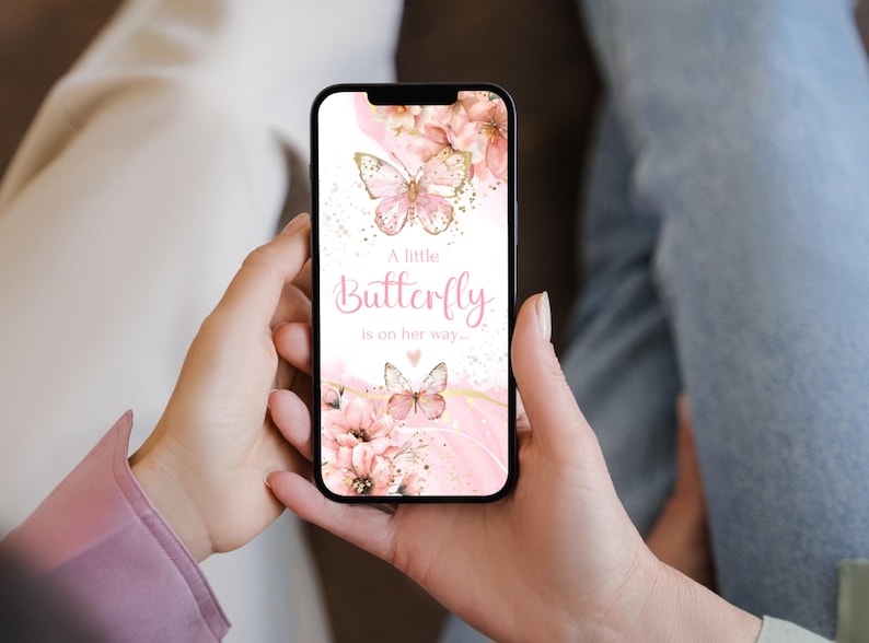 May include: A pink and gold smartphone wallpaper featuring a butterfly and flowers. The text reads "A little Butterfly is on her way."