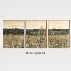 May include: A set of three framed landscape paintings depicting a field of wildflowers in shades of green, brown, and blue. The paintings are set against a backdrop of a distant forest line.