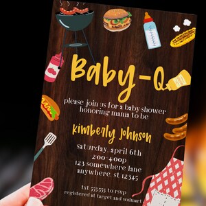 May include: A brown woodgrain background with a yellow text overlay that reads "Baby-Q". The text is surrounded by various barbecue-themed illustrations, including a grill, hot dogs, hamburgers, corn on the cob, a bottle of ketchup, a bottle of mustard, and a baby bottle. The text below the title reads "Please join us for a baby shower honoring mama to be Kimberly Johnson. Saturday, April 6th, 2:00-4:00p, 123 Somewhere Lane, Anywhere, ST 12345. Text 555555 to RSVP. Registered at Target and Walmart."