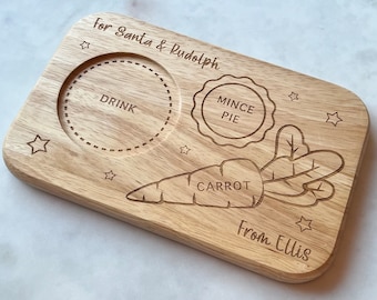 May include: A wooden serving tray with a carrot, a mince pie, and a drink cup, engraved with the text "For Santa & Rudolph", "Drink", "Mince Pie", "Carrot", and "From Ellis".