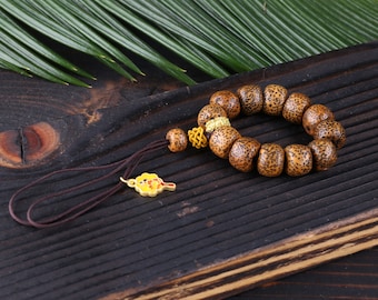 Ringed vajra bodhi wood keychain, golden