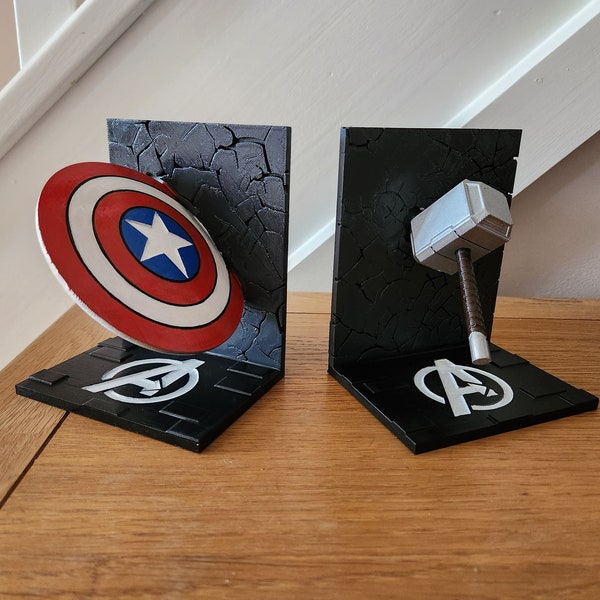 A PAIR of Avengers Bookends Captain America Shield and Thor's Hammer