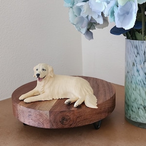 Golden retriever laying down figurine