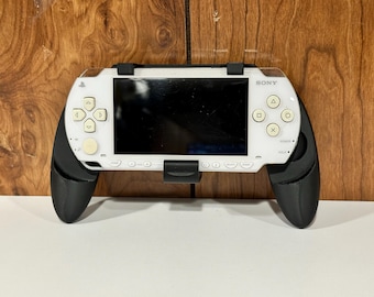 Mando portátil ergonómico Sony PSP 1000 Comfort Grip con clip para Playstation Portable