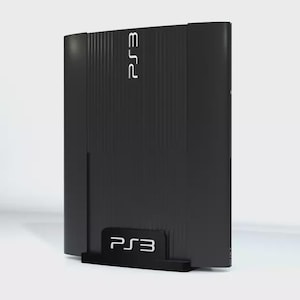 May include: A black PS3 console with a sleek, textured design. The console has a white PS3 logo on the front.