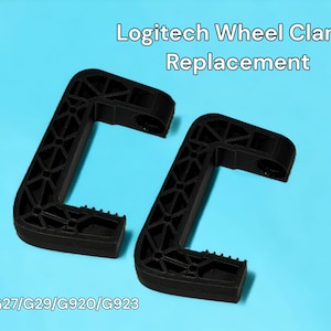 May include: Two black plastic wheel clamps for Logitech G25, G27, G29, G920, and G923 racing wheels.