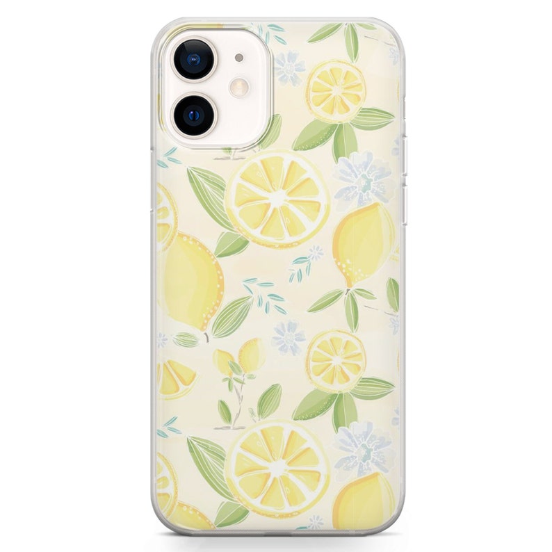 May include: A clear phone case with a pattern of yellow lemons, green leaves, and white flowers on a light yellow background.