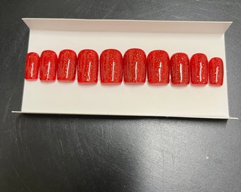 Adult red sparkly nails