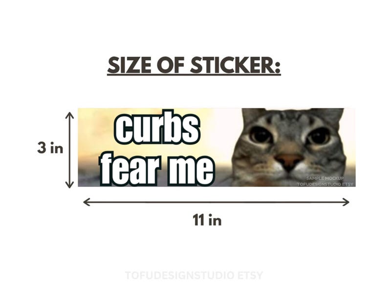 May include: A rectangular sticker featuring a gray tabby cat face on the right and the text "curbs fear me" in bold white letters with black outlines on the left. The sticker measures 3 inches by 11 inches as indicated by the visible dimension lines.