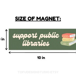 May include: A green rectangular magnet with the text "support public libraries" in white cursive font. The magnet is 3 inches tall and 10 inches wide. A stack of three books with colorful covers is illustrated on the right side of the magnet.