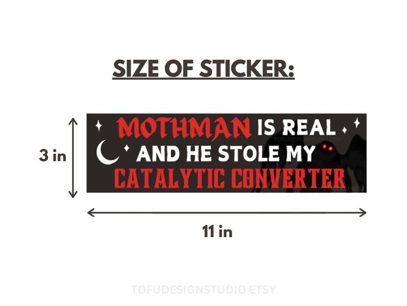 May include: A rectangular black bumper sticker featuring the red text MOTHMAN IS REAL AND HE STOLE MY CATALYTIC CONVERTER, a white crescent moon, and stars. A dark silhouette of a creature with glowing red eyes is visible. Dimensions are 7.62 cm by 27.94 cm.
