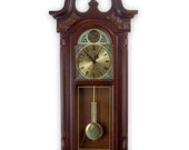 38 Inch Chiming Pendulum Wall Clock in Cherry Oak Finish