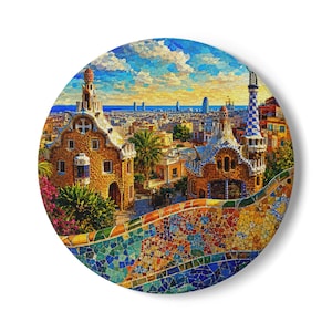 May include: A circular wall art piece featuring a vibrant, textured painting of Park Güell in Barcelona. The scene displays stone buildings with ornate roofs, a colourful mosaic-tiled serpentine bench in the foreground, and a city skyline.