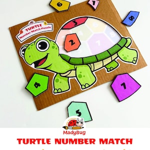 May include: A colorful turtle-themed number match puzzle for kids. The puzzle features a green turtle with a shell divided into numbered sections. Includes separate numbered pieces in various colors. The text "TURTLE NUMBER MATCH Fun Printable Game for Kids" is also visible.