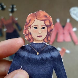 Printable red hair paper doll, cute cut-out dress up doll with clothes, retro autumn paper crafts for kids and adults