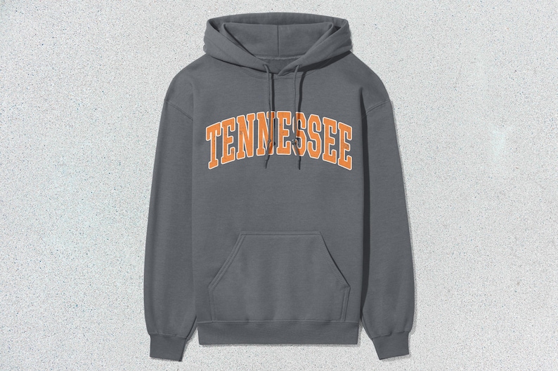 May include: A charcoal gray hooded sweatshirt with the word "TENNESSEE" printed in orange on the front.