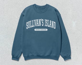 May include: A blue sweatshirt with white text that reads "Sullivan's Island, South Carolina".