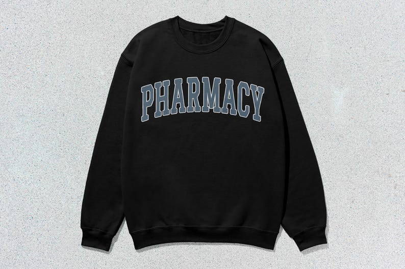May include: Black sweatshirt with a gray "PHARMACY" graphic in a collegiate font.