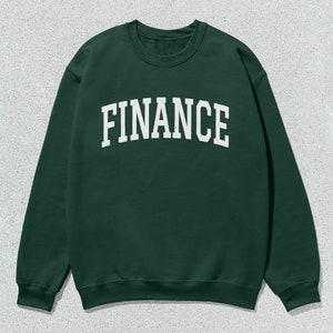 May include: A dark green sweatshirt with the word "FINANCE" printed in white on the front.