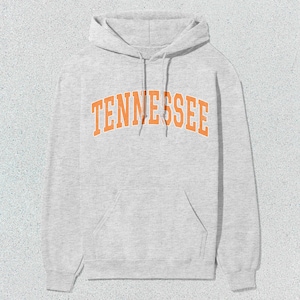May include: A gray hooded sweatshirt with the word "TENNESSEE" printed in orange on the front.