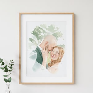 May include: A framed watercolour portrait of a couple in an embrace. The person on the left wears a dark green jacket, while the person on the right has long light brown hair and is smiling. The background features soft green foliage accents.