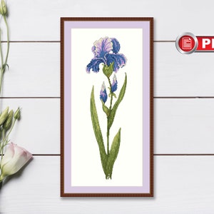 May include: A cross-stitch pattern of a purple iris flower with green leaves in a brown frame.