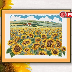 Może przedstawiać: Wzór do haftu krzyżykowego przedstawiający pole słoneczników w pełnym rozkwicie z małym domkiem w oddali. Wzór znajduje się w jasno pomarańczowej ramie.