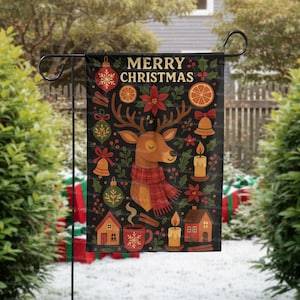 May include: A black Christmas garden flag featuring a deer wearing a red scarf, surrounded by festive illustrations. The flag includes the text "MERRY CHRISTMAS" and images of ornaments, candles, and houses. The flag is displayed outdoors.