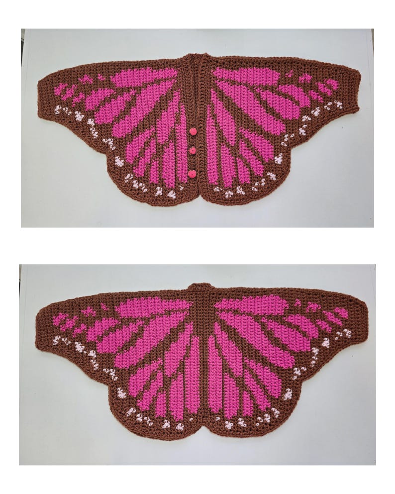 May include: A crochet butterfly wing shawl featuring a brown base with vibrant pink panels and small white accents along the edges. The top view shows three small pink buttons along the center seam, while the bottom view displays the full wing design.