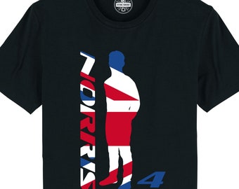 May include: Black t-shirt featuring a silhouette of a person wearing a Union Jack flag pattern and the word "NORRIS" in white letters. The number "4" is printed in blue and white on the right side of the shirt.