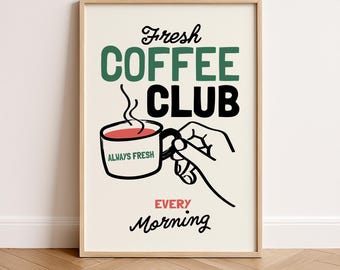 May include: A framed poster with a coffee theme. The poster features the words "Fresh Coffee Club" in green and black, with a steaming coffee cup and the words "Always Fresh" and "Every Morning."