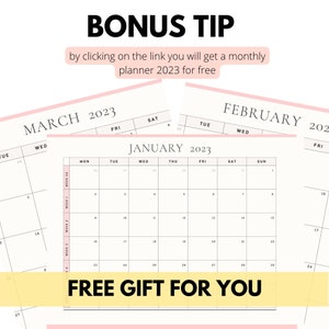 May include: A close-up of a calendar page for January 2023. The calendar is printed on white paper with black text. The calendar is surrounded by a pink border. The text "FREE GIFT FOR YOU" is printed in yellow on a white background.