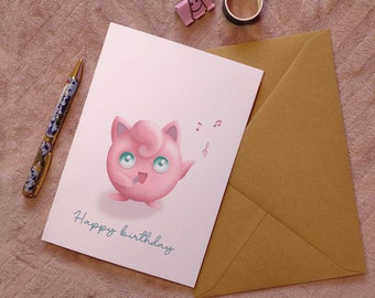May include: A pink and white birthday card with a cartoon pink pig singing with musical notes. The card says "Happy birthday".