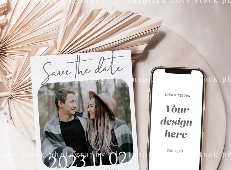 May include: A mock-up featuring a 'Save the Date' card with a couple's photo and the date '2023 11 02'. A smartphone displays 'Your design here'. The background includes a dried palm leaf and a neutral-toned surface.