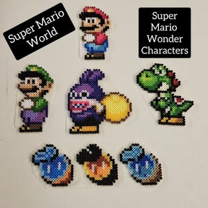 May include: Super Mario World and Super Mario Wonder characters made with colorful perler beads. The characters include Mario, Luigi, Yoshi, and a purple Goomba.