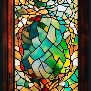 May include: A stained glass window with a colorful abstract design. The design features a variety of shapes and colors, including blue, green, yellow, orange, and red.